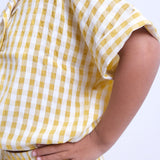 yellow checkered short-sleeved shirt
