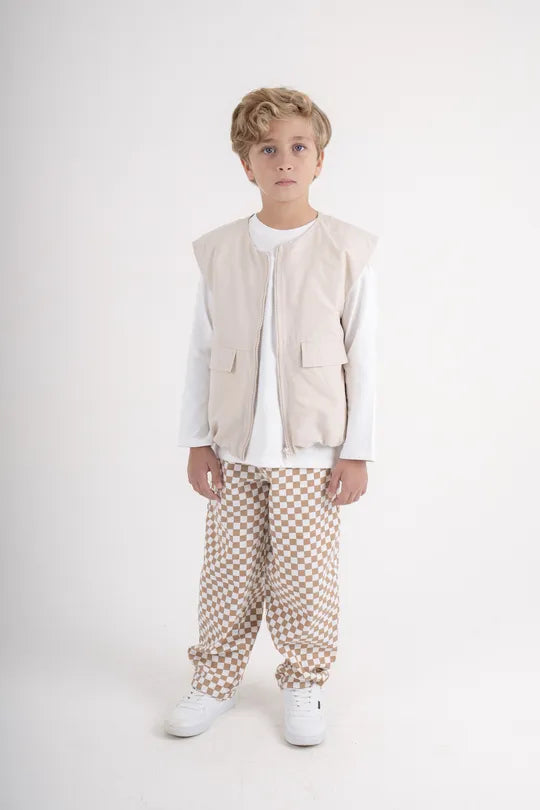 with the beige check pants