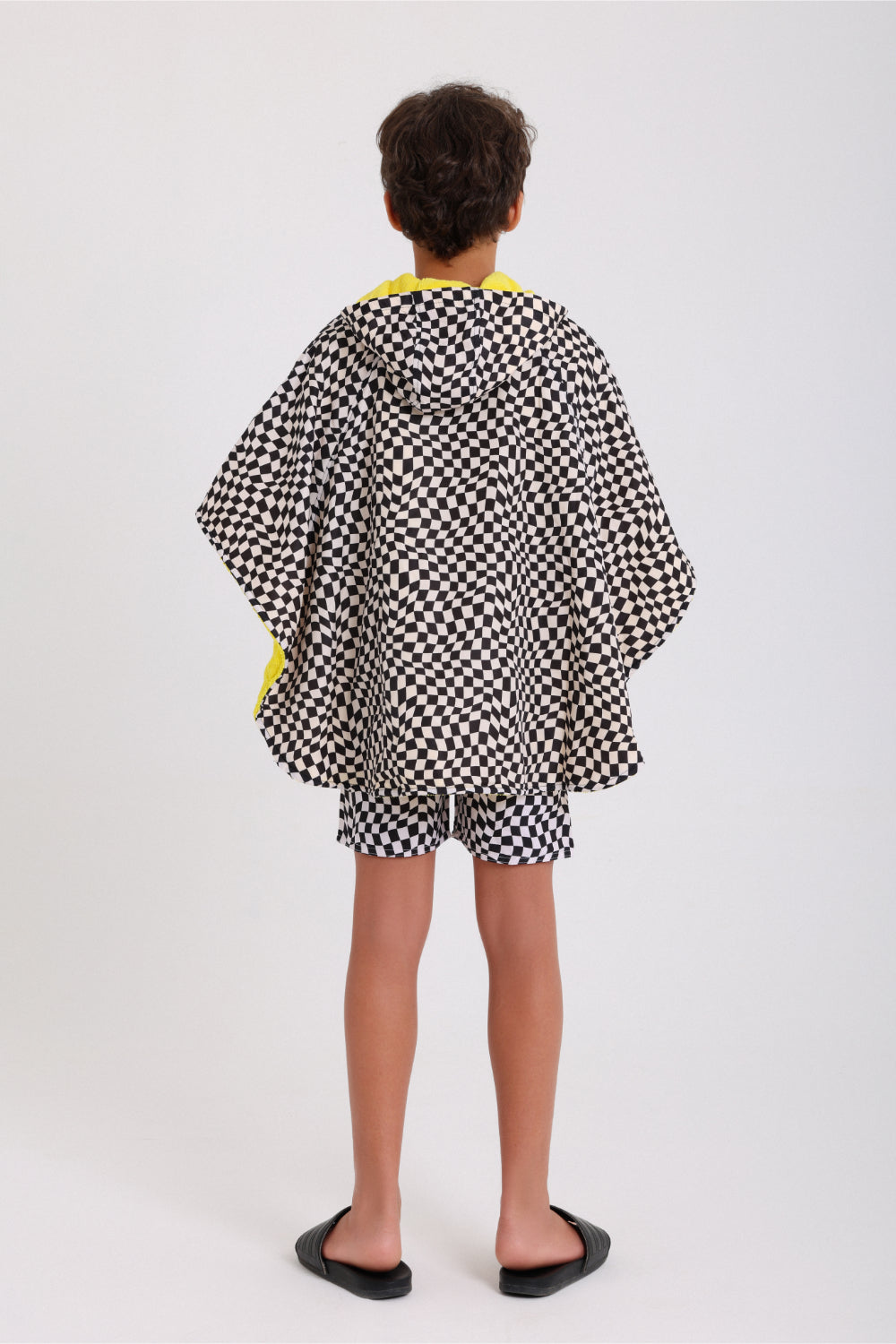 boys waterproof poncho – black & white checkered