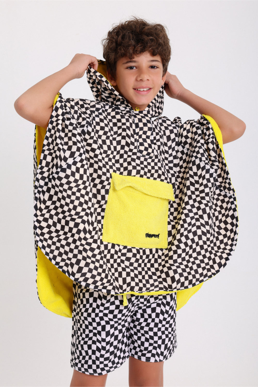 boys waterproof poncho – black & white checkered