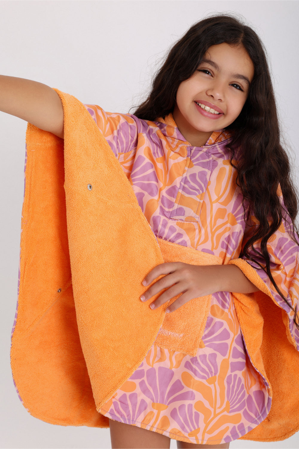 girls waterproof poncho – orange & purple with floral print