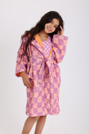 girls waterproof swim robe – dusty pink & purple checkered