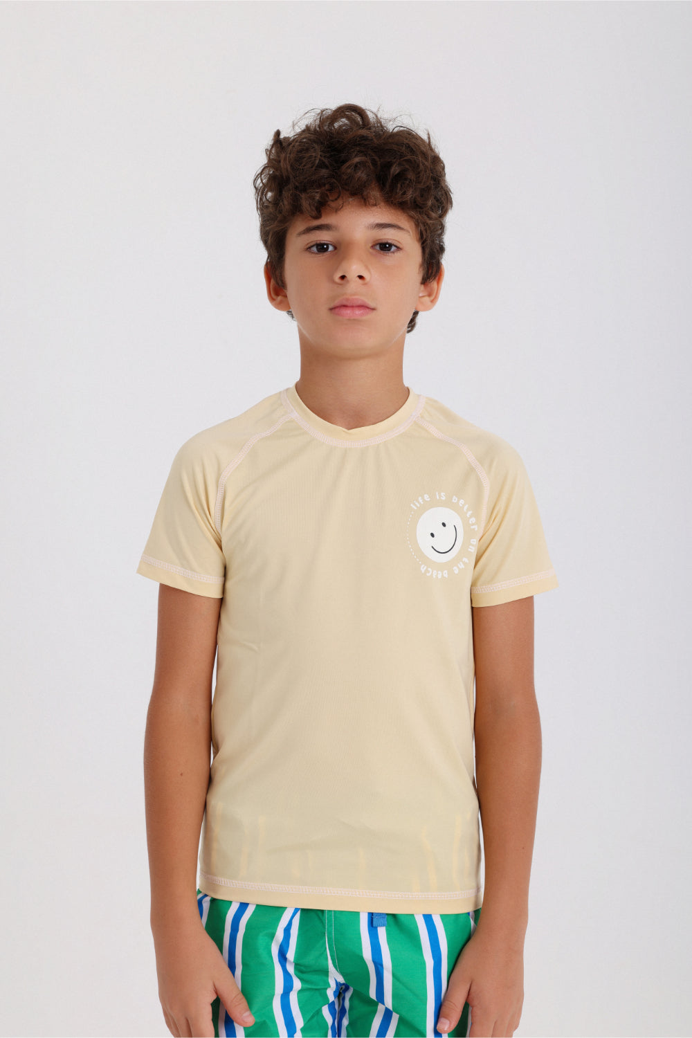 boys short sleeve rash guard – beige with "life is better on the beach" print