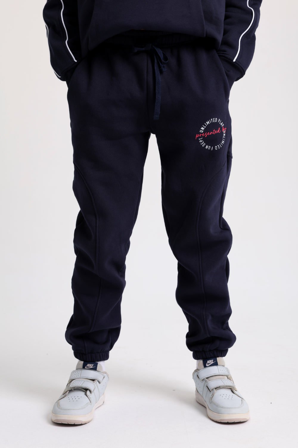 boys cotton sweatpants – navy with "unlimited play presented by unlimited fun dept" print