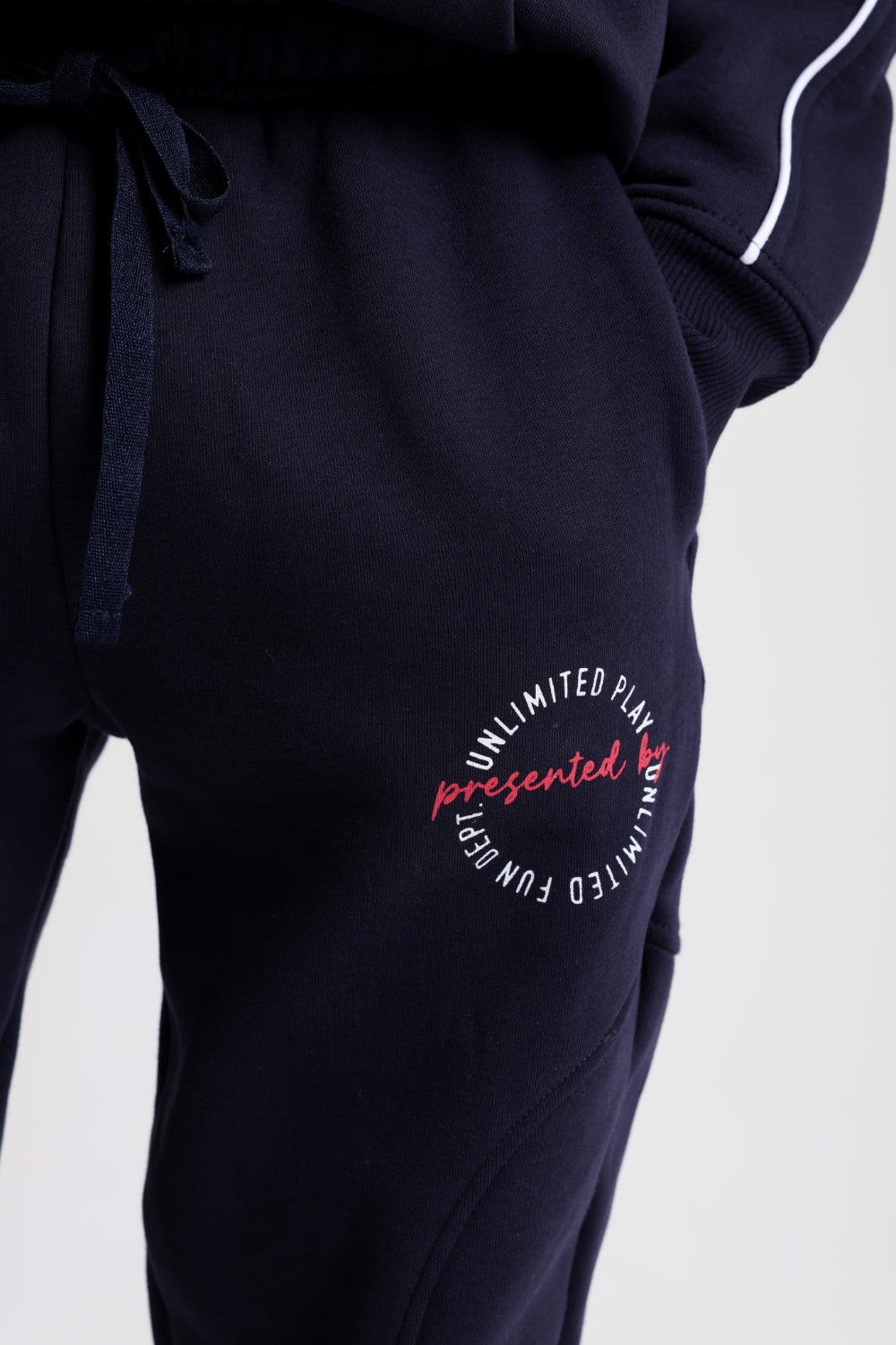 boys cotton sweatpants – navy with "unlimited play presented by unlimited fun dept" print