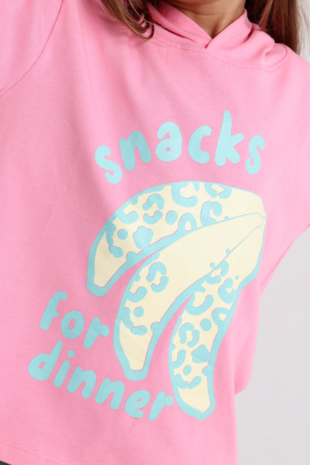 girls cotton hoodie – pink with "snacks for dinner" bananas print