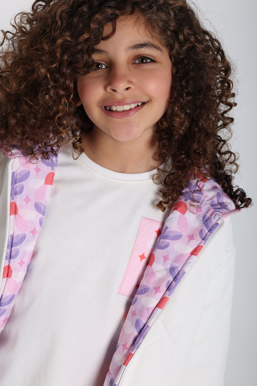 girls waterproof reversible quilted jacket –off white & pink floral