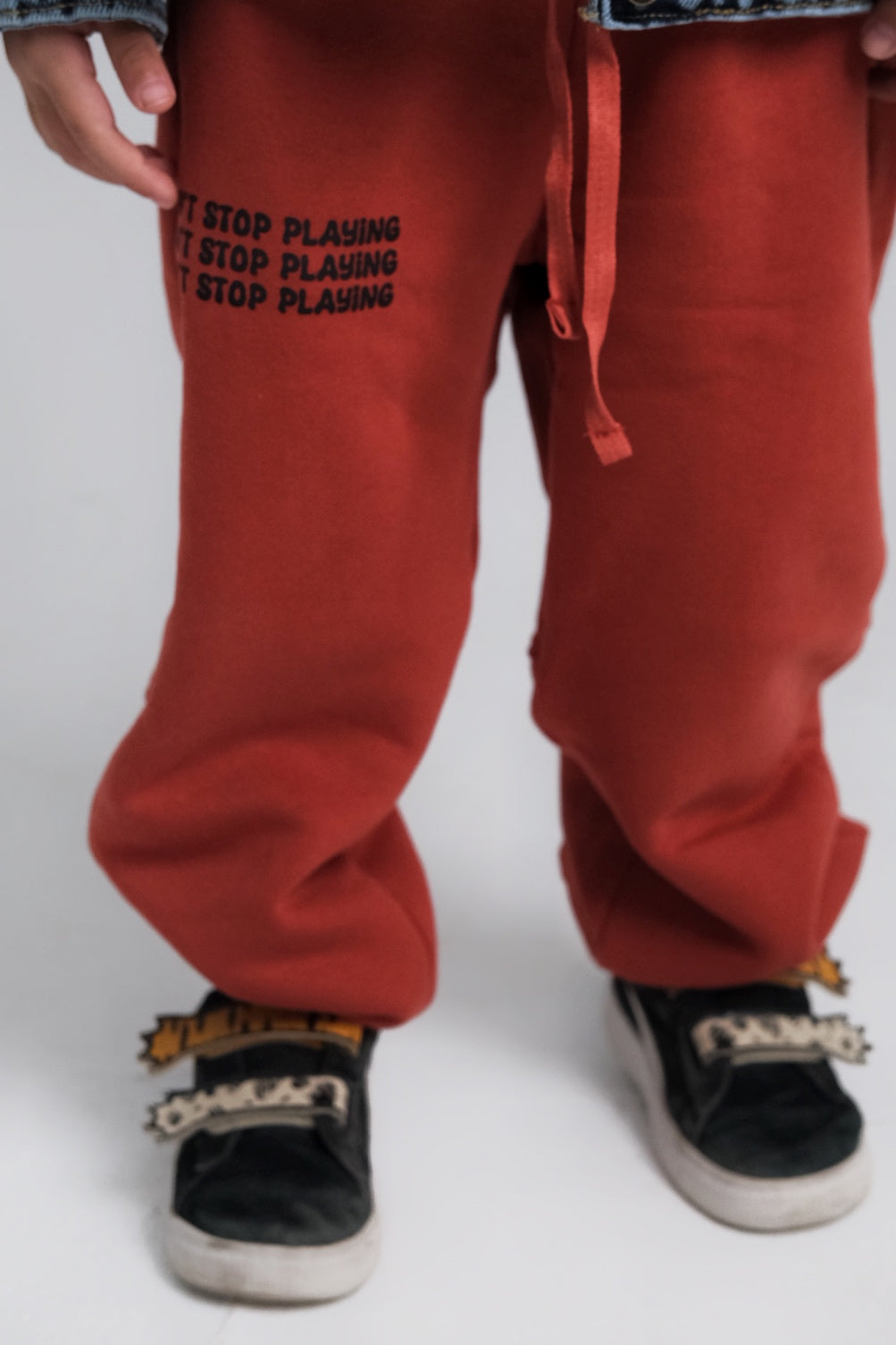 unisex brick "don't stop playing" sweatpants