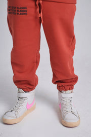 unisex brick "don't stop playing" sweatpants