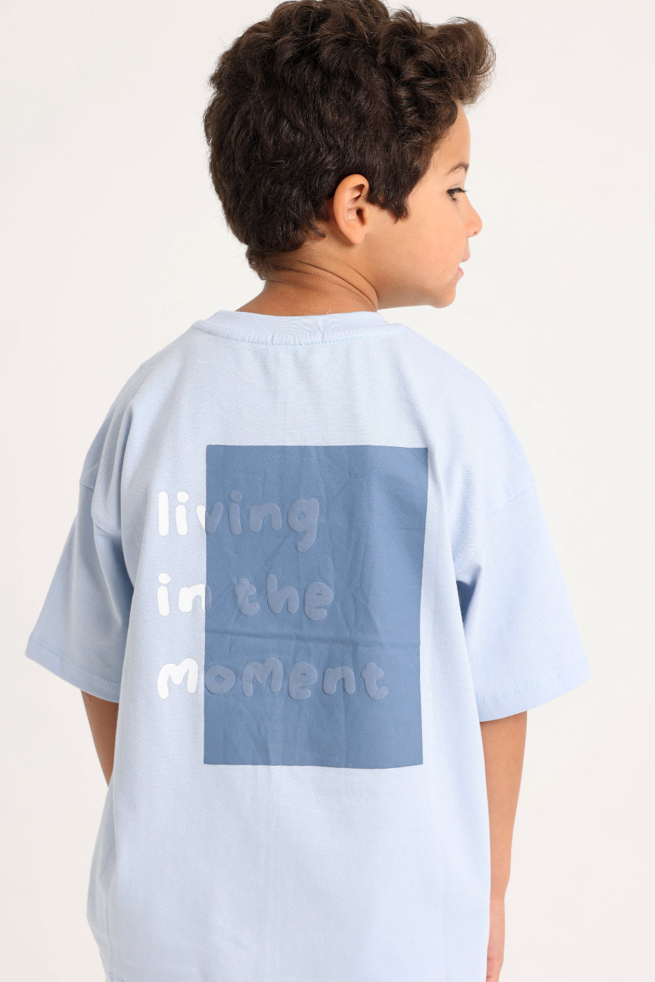 unisex kids cotton t-shirt – baby blue "living in the moment"