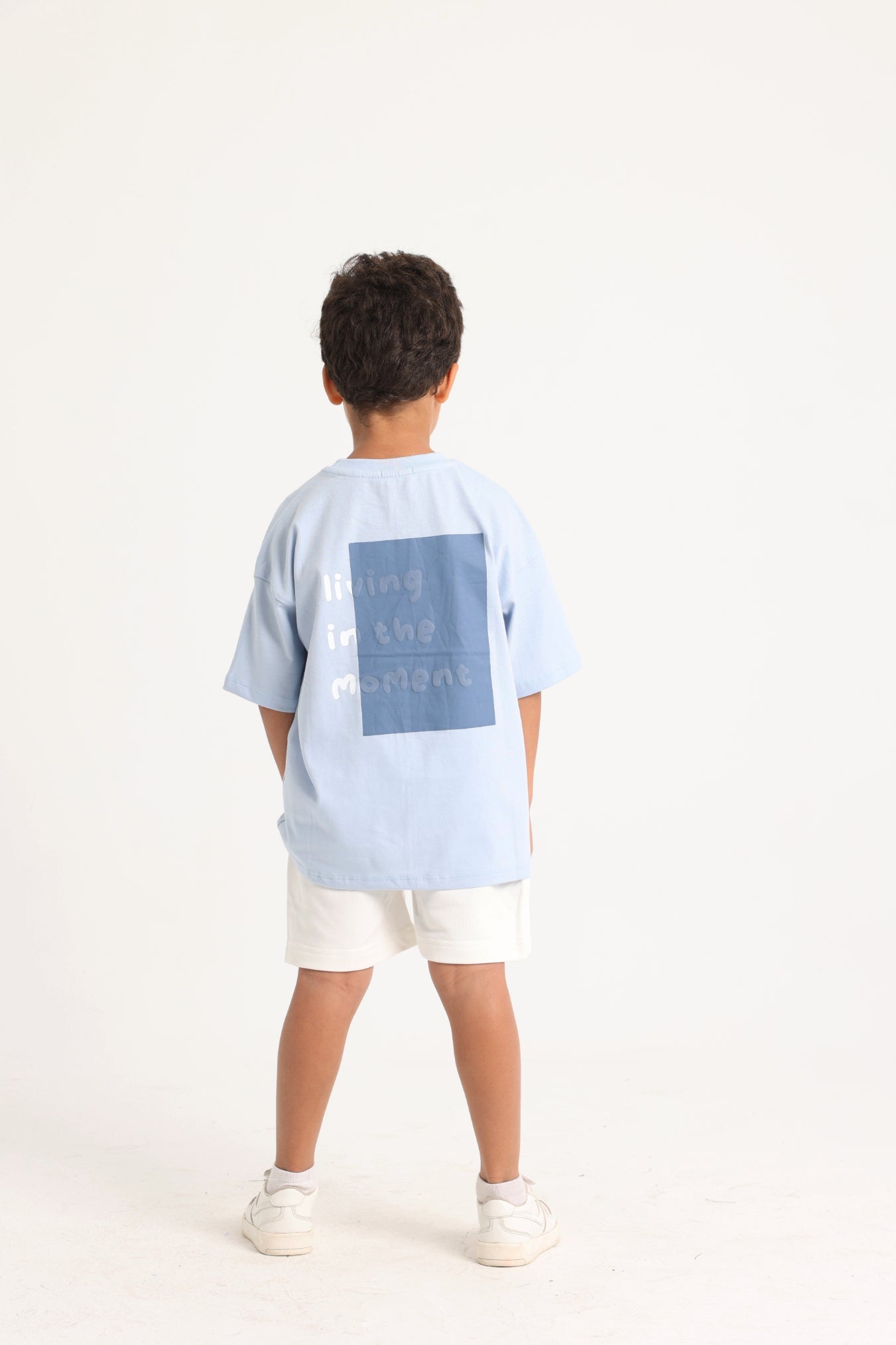 unisex kids cotton t-shirt – baby blue "living in the moment"
