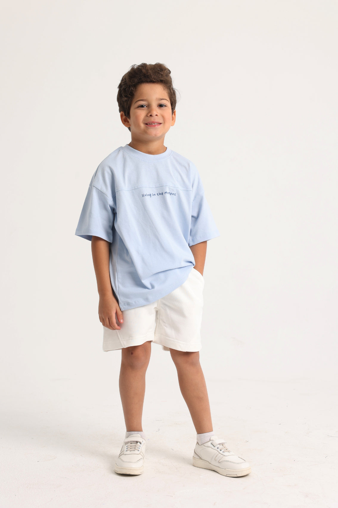 unisex kids cotton t-shirt – baby blue "living in the moment"