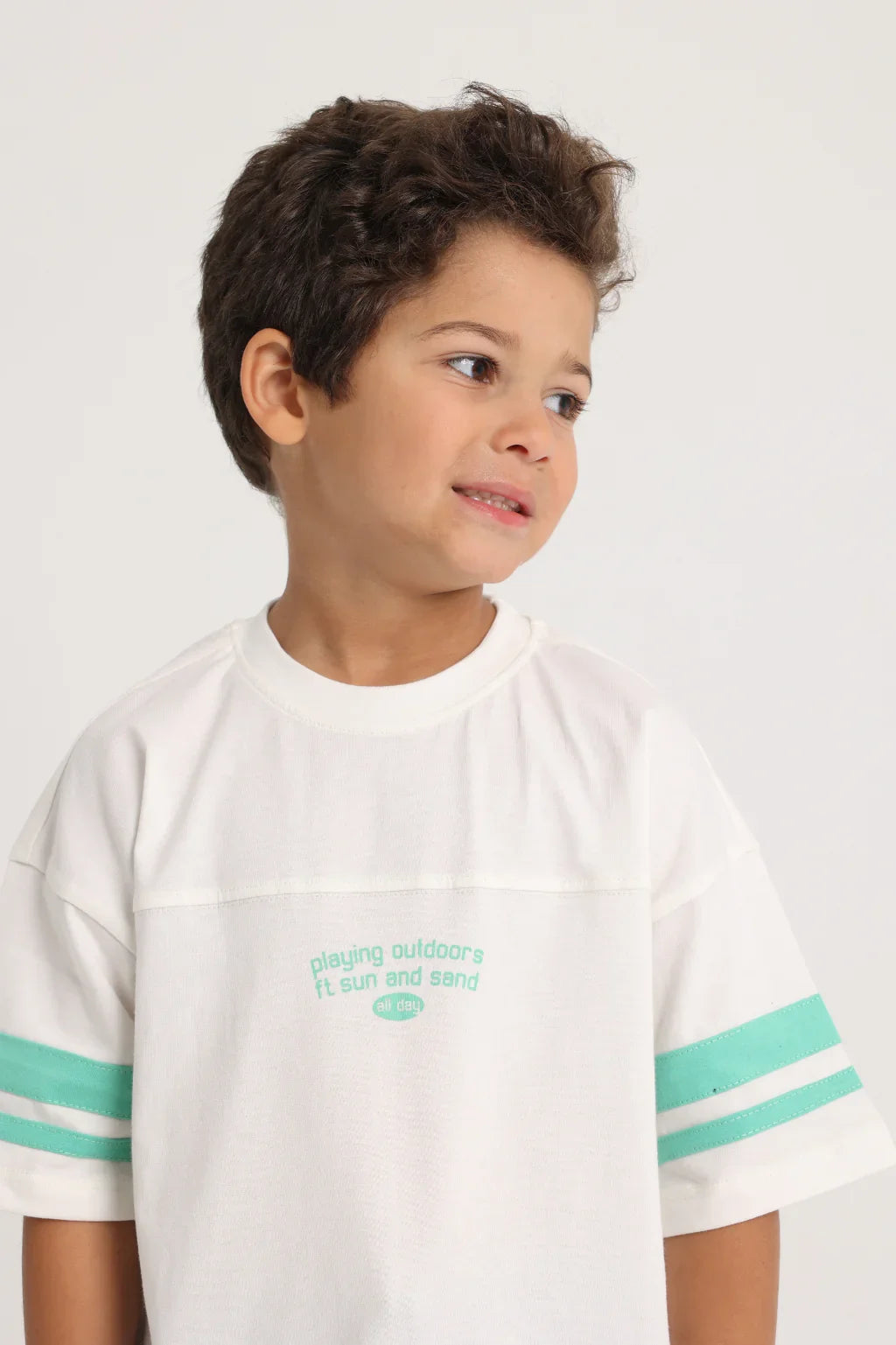 unisex kids cotton t-shirt – off-white "playing outdoors" - playmore