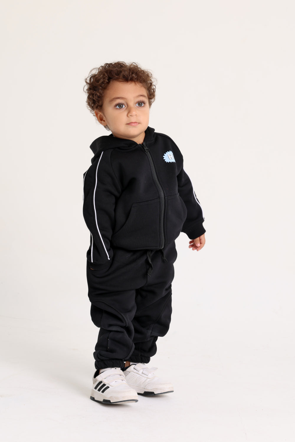unisex baby cotton hoodie – black with “hi“ design