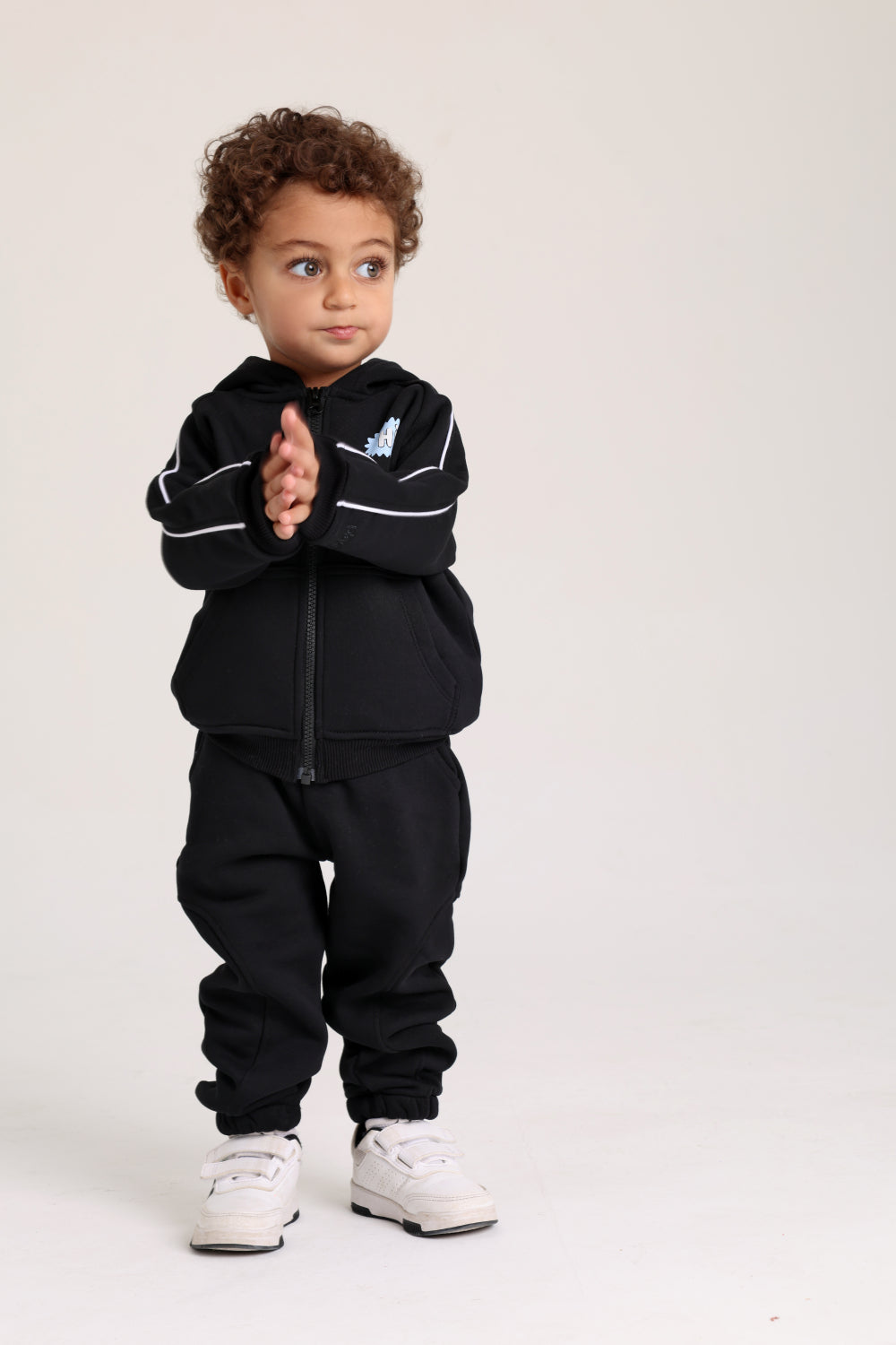 unisex baby cotton hoodie – black with “hi“ design