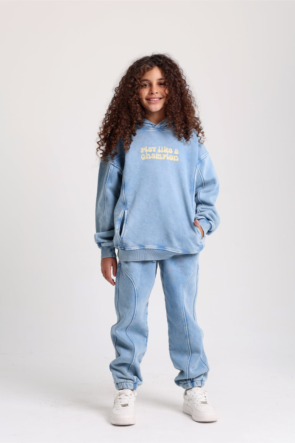 unisex cotton hoodie – baby blue with "play like a champion" print