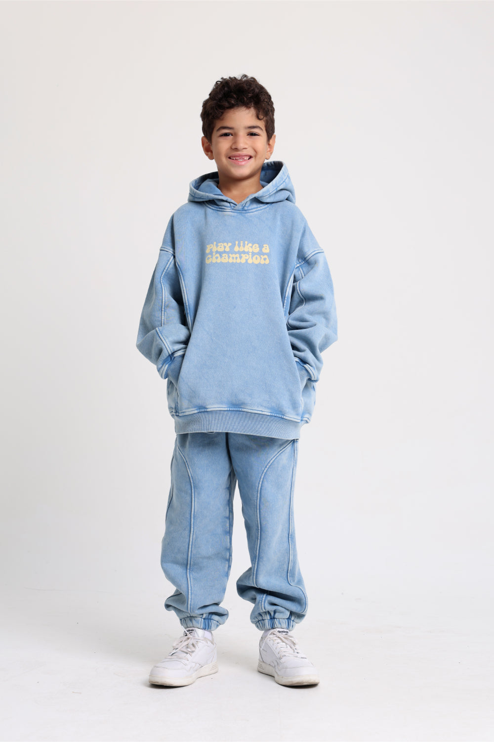 unisex cotton hoodie – baby blue with "play like a champion" print