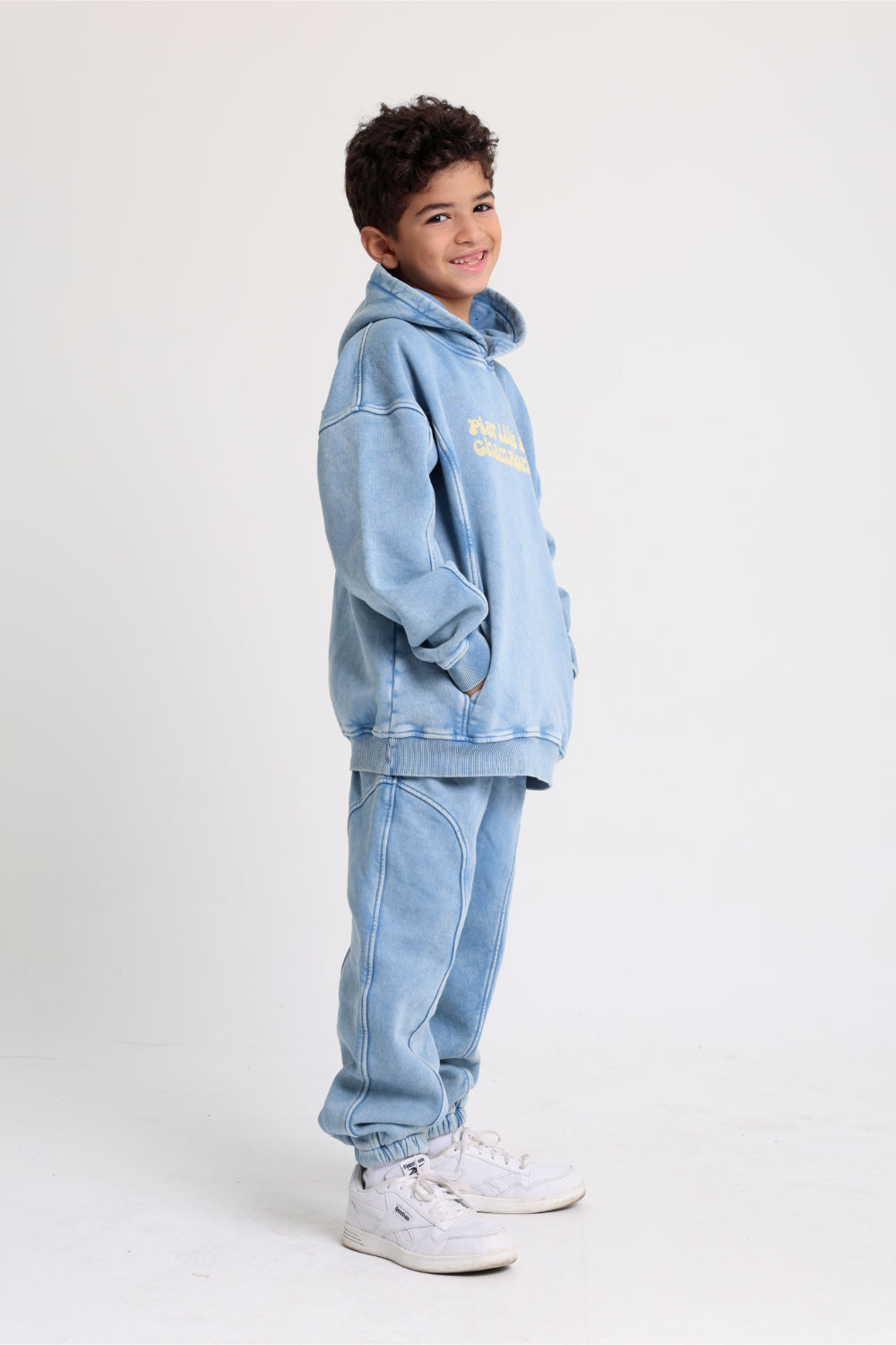 unisex cotton hoodie – baby blue with "play like a champion" print