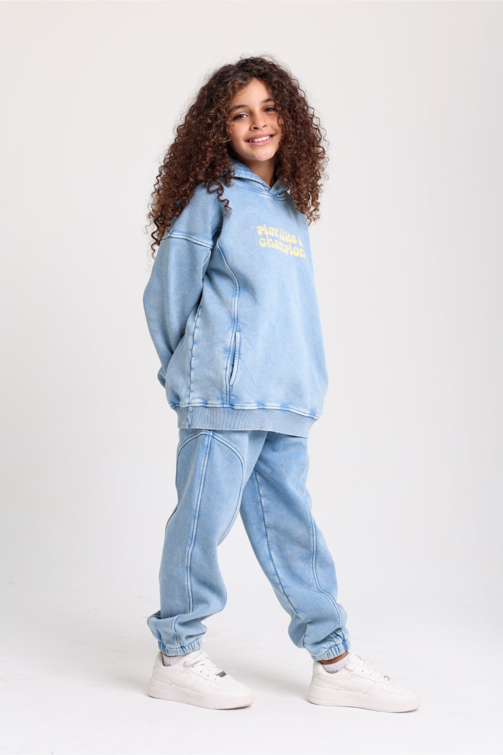 unisex cotton hoodie – baby blue with "play like a champion" print