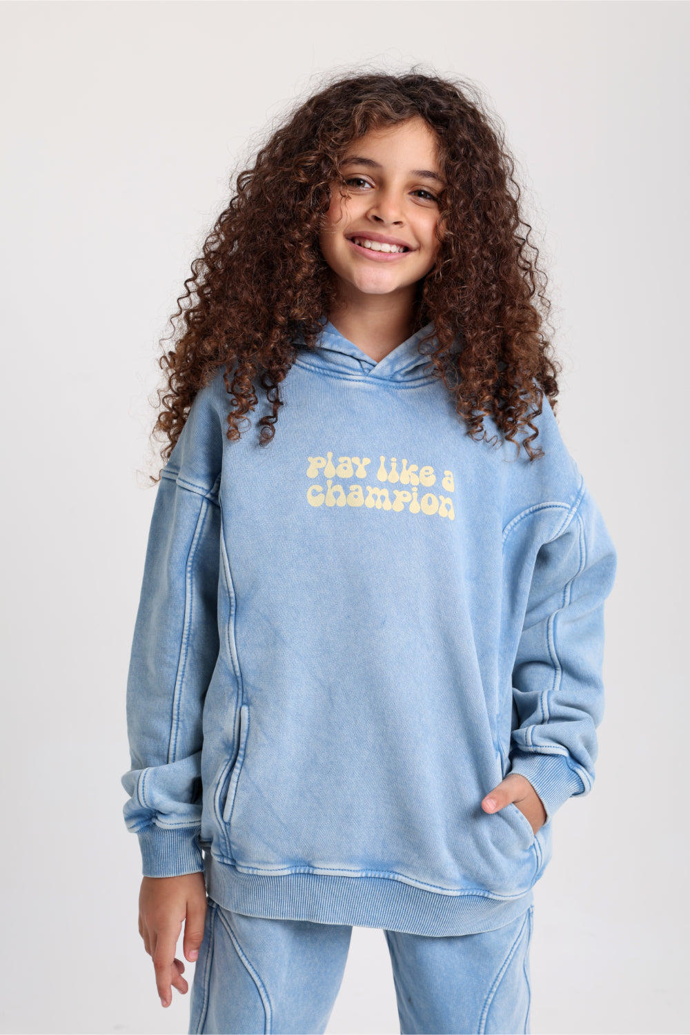unisex cotton hoodie – baby blue with "play like a champion" print