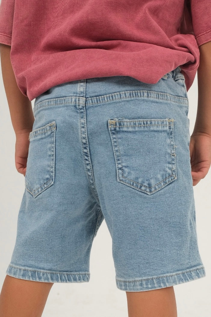 ripped light blue jean shorts