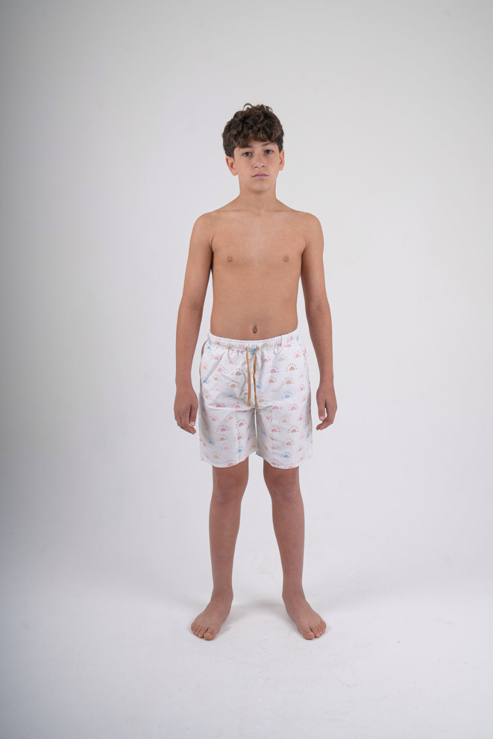 boys swimsuit – off-white with colorful suns print
