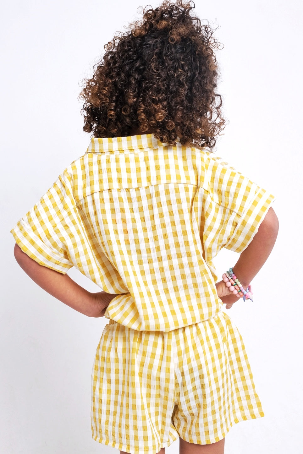 yellow checkered short-sleeved shirt
