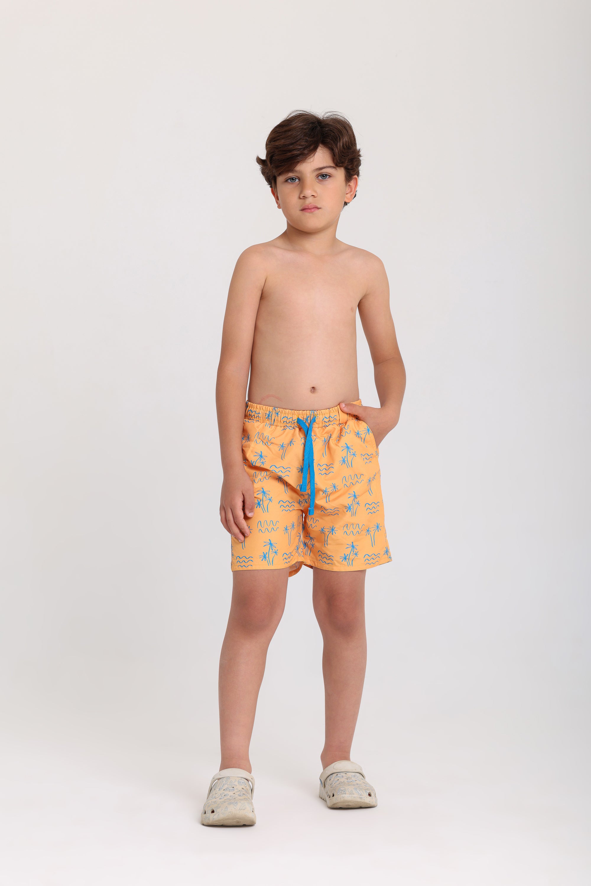 boys swimsuit – mustard with palm print