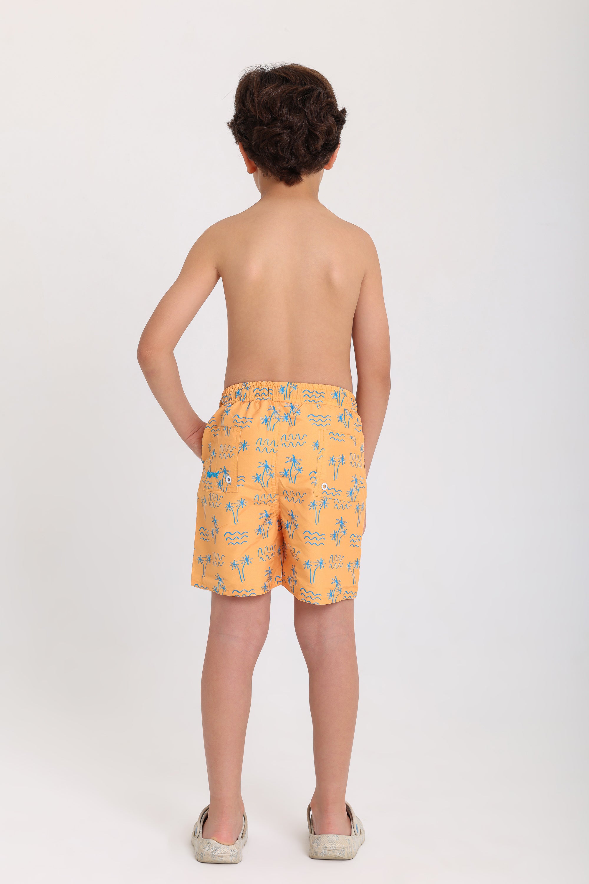 boys swimsuit – mustard with palm print